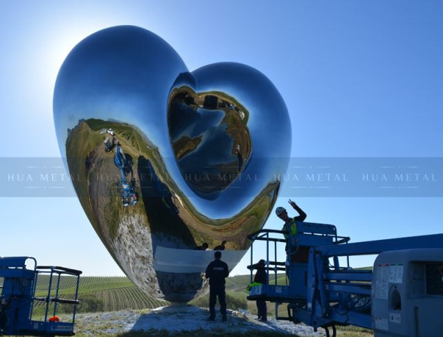 بازتاب آینه مجسمه سازی از فولاد ضد زنگ